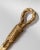 This elegant vintage bottle opener from 1960s Italy is crafted in brass and designed in the shape of a rope with loop. Its...