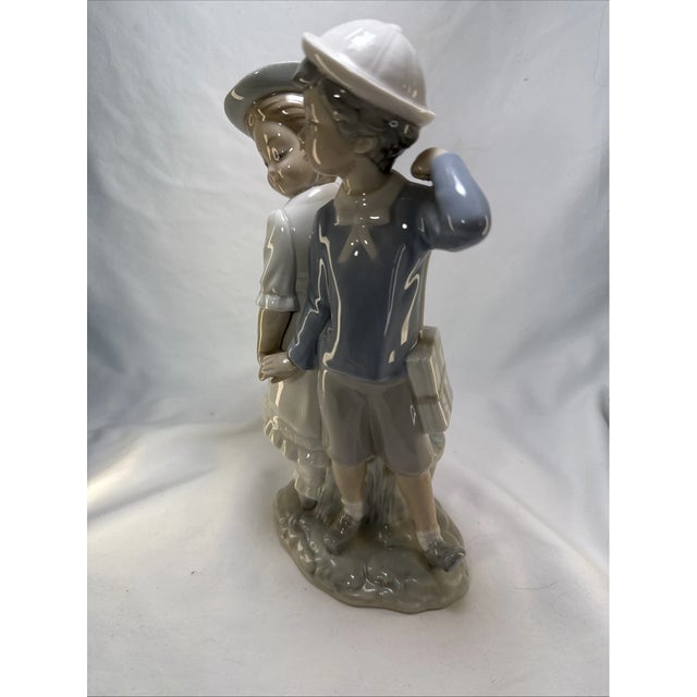 Bring timeless charm to your collection with this beautiful vintage Lladró “Puppy Love” porcelain figurine (#1127). First...