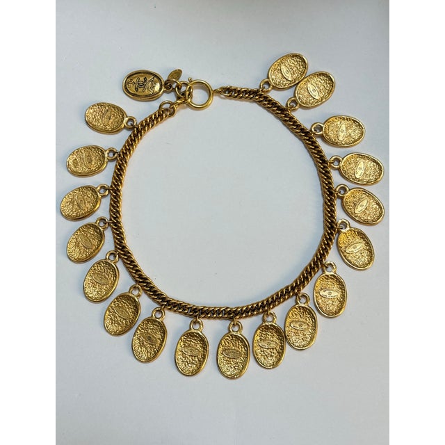 A rare, breathtaking statement piece from Chanel's iconic 1990s era (Season 26). This vintage masterpiece features a...