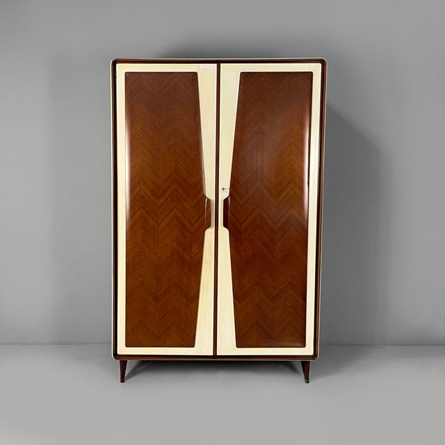 Italian Art Deco wardrobe in wood and white wood, 1940s Two-door wardrobe in wood with white-beige wooden trim. Inside,...