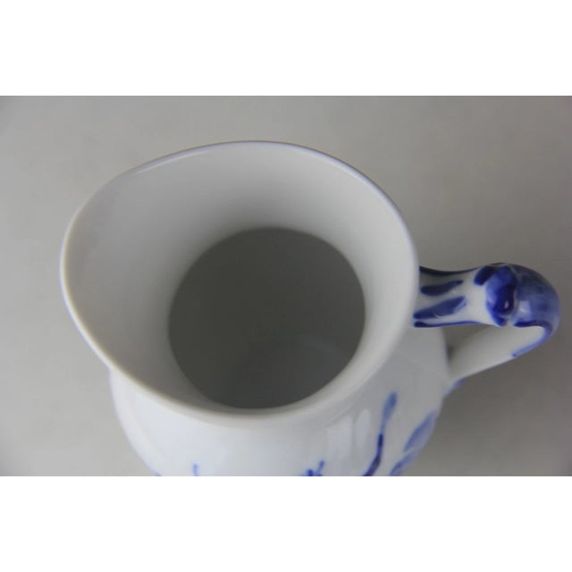 Beautiful vintage sugar bowl and creamer set by Royal Copenhagen in the classic Blue Flowers pattern. This desirable...