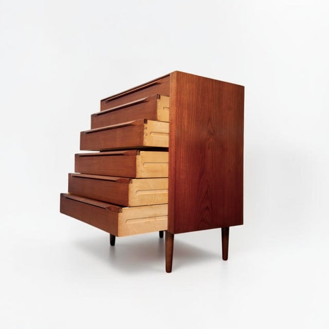 Tall teak chest of drawers designed by ib kofod-larsen for säffle möbelfabrik, sweden, 1960s the chest features six...