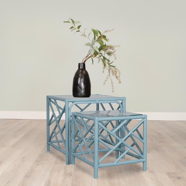 This exquisite set of rattan nesting tables blends classic chinoiserie charm with modern sophistication. Crafted with a...