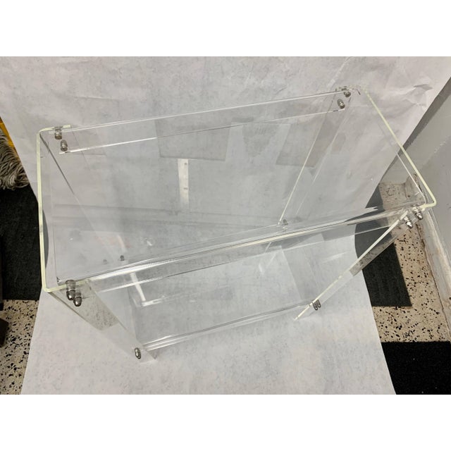 This lovely smaller scale console table is in great vintage condition, solid and very clean lines. Two tiers and very...