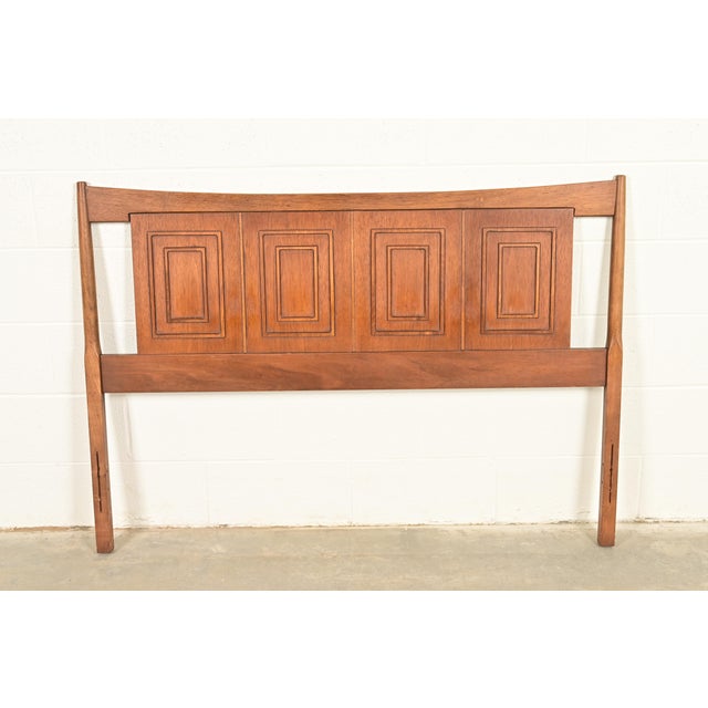 An exceptional Mid-Century Modern sculpted walnut full size headboard By Broyhill, "Sculptra" Collection USA, 1960s...