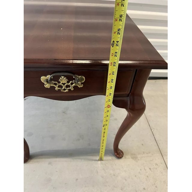 Classic vintage mid-century cherry end table by Bassett Furniture, showcasing the timeless simplicity and clean lines...