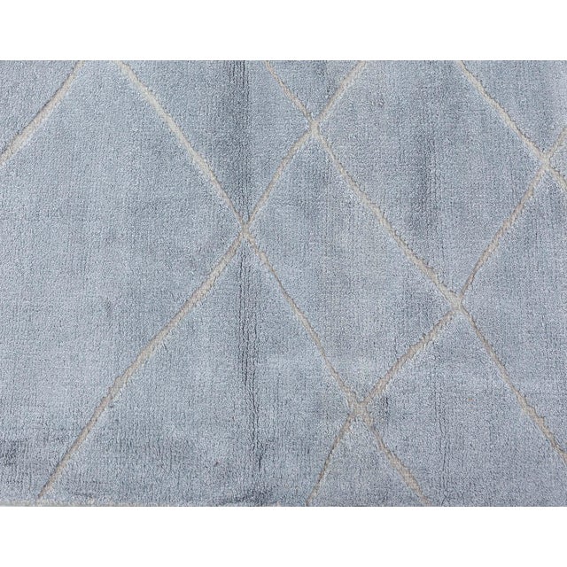 Contemporary High and Low Gray Rug Size: 5'6" × 6'9" (167 × 205 cm) A contemporary, geometric, high-low hand-knotted in...