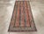 An antique Caucasian Karabagh rug handmade during the Early 20th century. Measures: 3' 3" x 7' 1"
