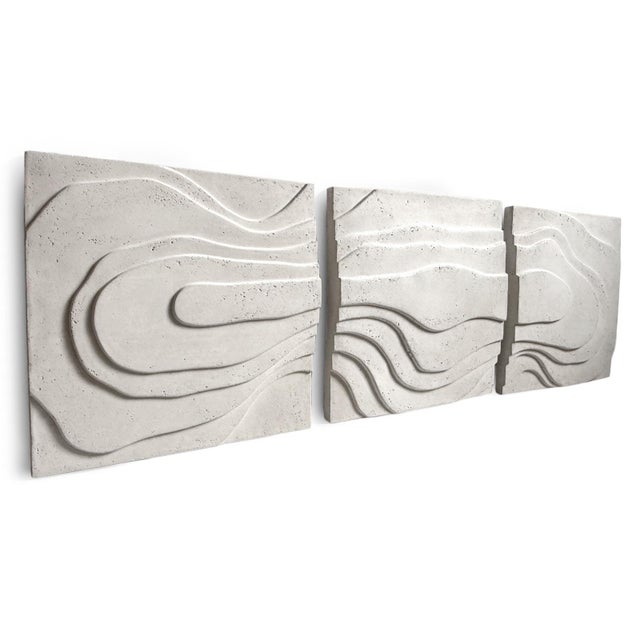 Create a calming focal point with this plaster triptych wall art, featuring three 24" x 24" panels that come together to...