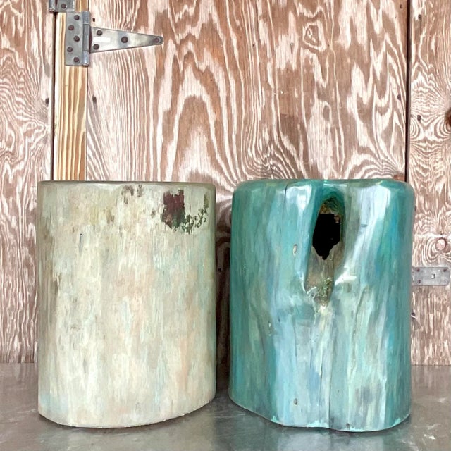 A stunning set of two vintage Boho low stools. A chic blue green color wash on two organic tree stump stools. Solid wood...