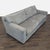 This Crate and Barrel 3-seat sofa features a soft gray fabric and clean, modern lines. It offers generous seating space...