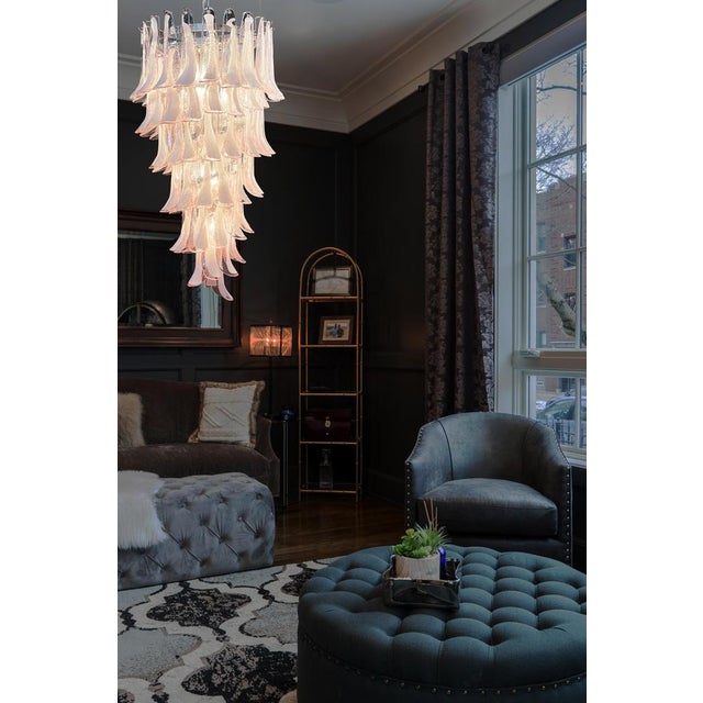 Beautiful and huge Italian Murano Chandelier composed of 83 splendid glass petals (pink and white “lattimo”) that give a...