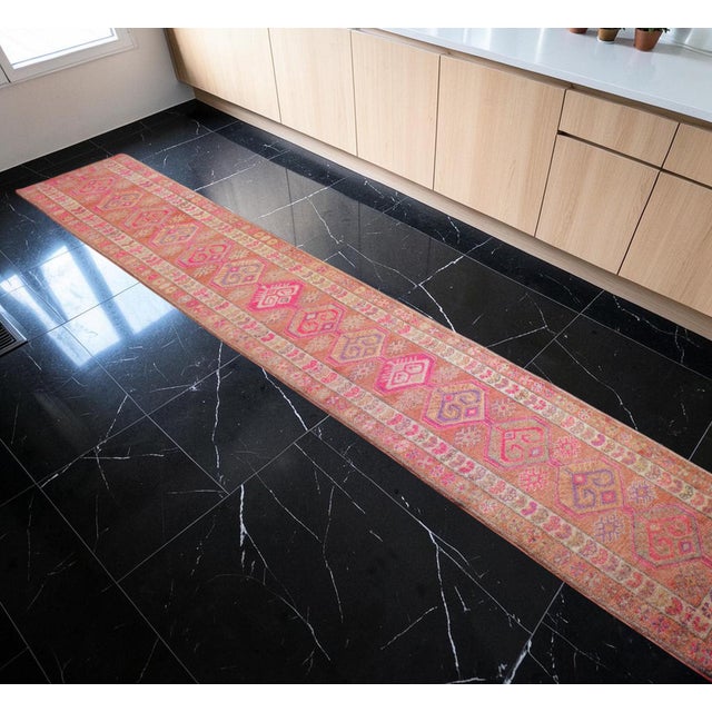 This exceptional 1960s hand-knotted wool runner rug from Southeastern Anatolia stands out for its extraordinary length and...