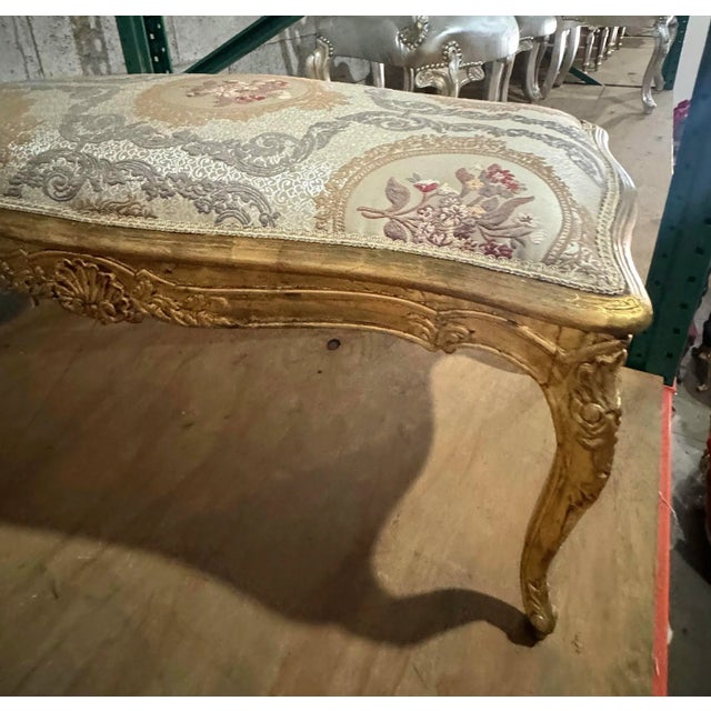 This bench showcases beautiful craftsmanship in every detail. It has been fully refinished in genuine gold leaf and boasts...