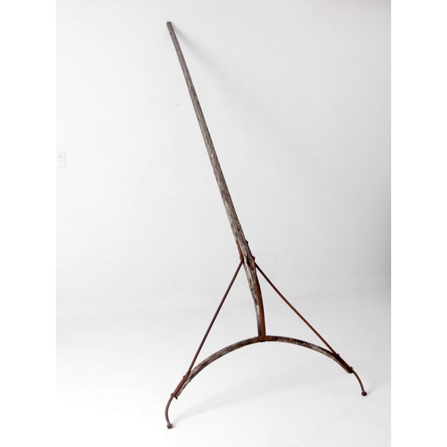 Antique horse-drawn wagon shaft, or thill, with an exceptionally sculptural form and commanding presence. The long,...