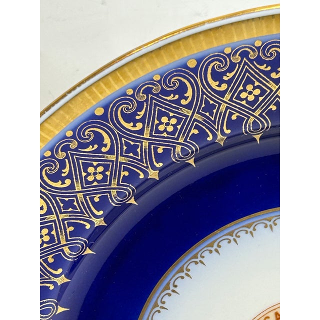 This item is an antique porcelain plate made by the Onondaga pottery company later known as Syracuse China for the...