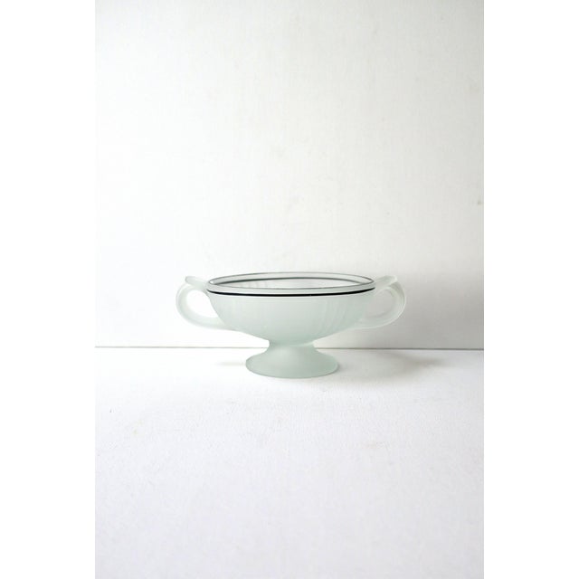 An urn glass bowl with handles, Art Deco period, circa early-20th century. Bowl is white frosted glass with art deco deign...