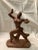 This vintage art – deco inspired ceramic sculpture features a gracefully posed male dancer. Captured in mid – movement...
