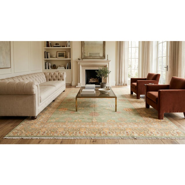 Transform your living space with this exquisite Modern Khotan Style Rug, hand-knotted from premium wool. The calming sage...