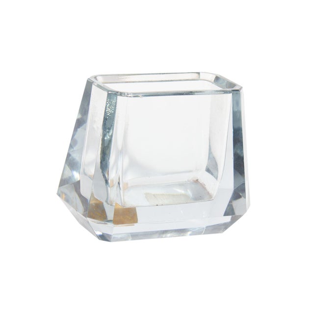 A vintage Murano glass vase produced by Seguso. Made in Italy, this pale blue-gray vase has faceted sides and is marked...