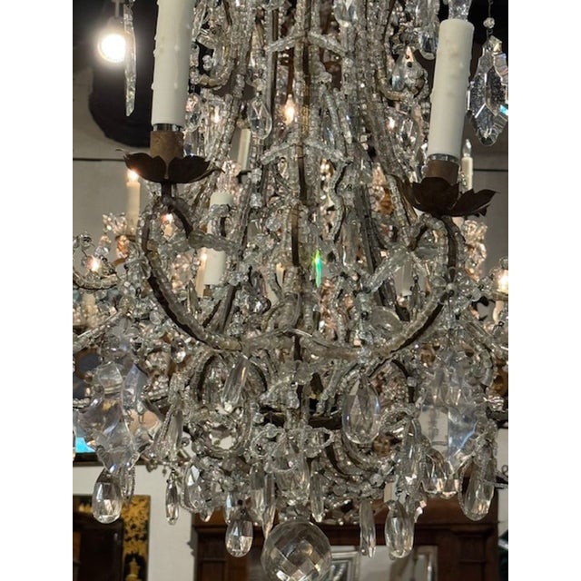 The 19th century Italian beaded chandelier is a beautiful and elegant lighting fixture that adds a touch of sophistication...