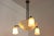 This elegant French Art Deco chandelier, dating to circa 1925 and attributed to the renowned glassmakers Muller Frères of...