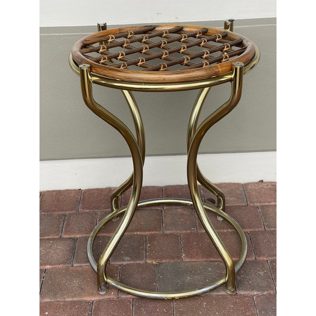 Mid century modern vintage Milo Baughman table base of plant stand in gold tone tubular metal and bamboo top.