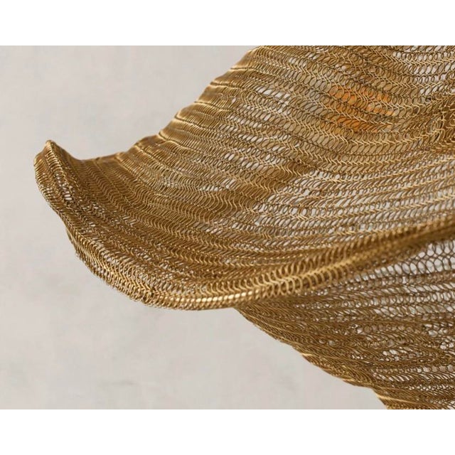 Crafted from a woven stainless steel that gives the appearance of mesh, the Mirza Lighting Collection bestows an ethereal-...