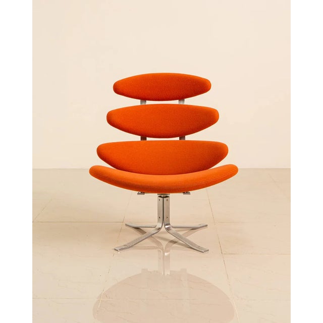 The "corona" lounge chair by poul volther for erik jørgensen, in orange wool from the 60s, is an exceptional piece....