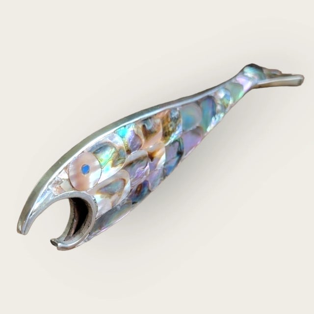 Capture the Essence of Mid-Century Charm with this Exquisite Vintage Abalone Fish Bottle Opener! Elevate your barware...