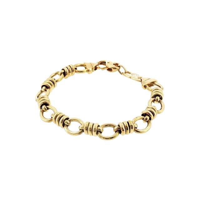A late 20th-century Italian 18k gold link bracelet. Elegant and refined! Features intricate link detailing. Weighs 14.7g....