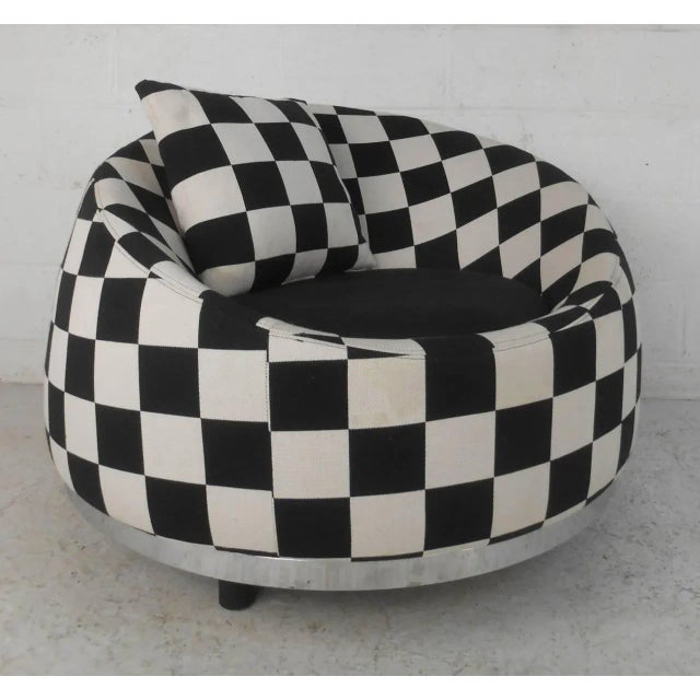 This stylish contemporary modern club chair features chrome trim, black and white checkered upholstery, a 17" seat height,...