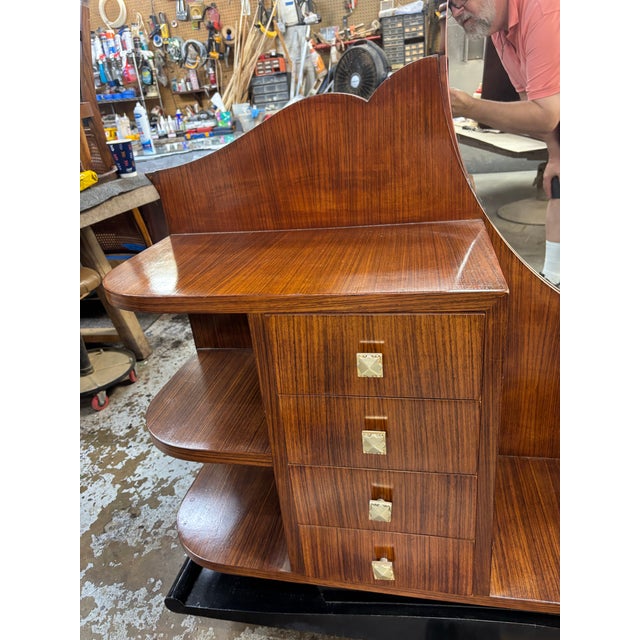 This 1930s French mirrored vanity is a stunning antique piece perfect for adding a touch of elegance to any room. Standing...