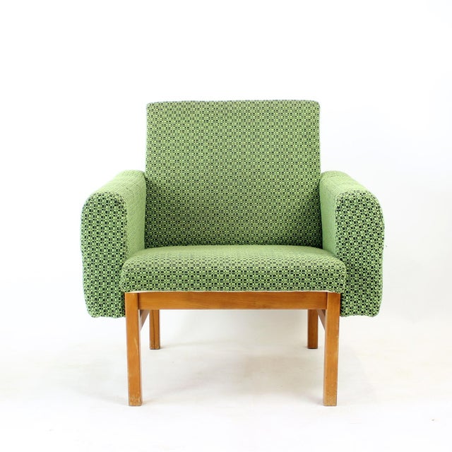 Beautiful Mid-Century Modern armchair produced in Czechoslovakia during the 1960s. This exceptional vintage piece features...
