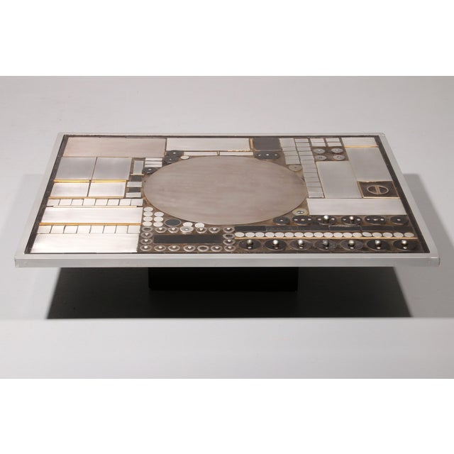 This exceptional coffee table by Belgian artist Raf Verjans is far more than a piece of furniture; it is a sculptural...