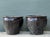 This pair of vintage glazed ceramic planters brings depth, weight, and artisanal character to any planting scheme. Each...