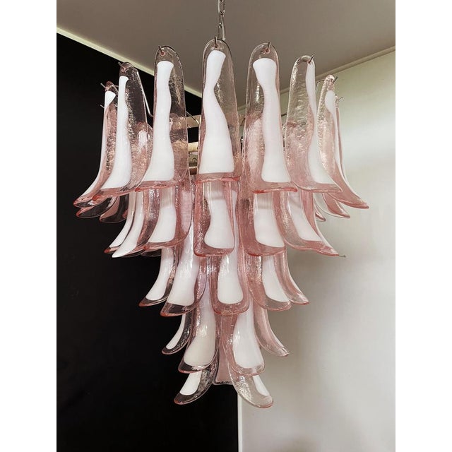 Huge italian vintage murano chandelier made by 52 glass petals (pink and white “lattimo”) in a chrome frame. period: late...