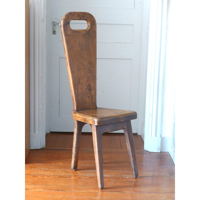 Sculptural chair with high back in solid olive wood, Maison Dubosq, 1960s/70s, in good condition however, a wooden...