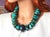 The length of the necklace is 22 inches (56 cm). The size of the rondelle beads varies from 16 mm to 40 mm. Turquoise...