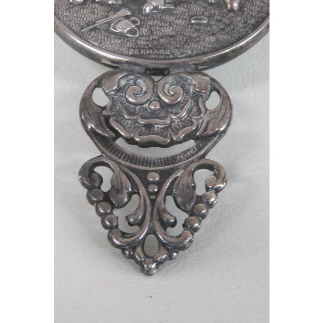 This exquisite handheld mirror is made out of metal, we believe silver plated, and is in good condition. This Hand Mirror...