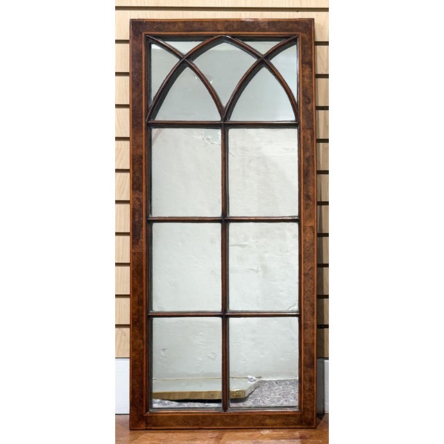 A handsome large rectangular window pane paneled mirror from England - featuring a burl walnut frame with decorative...