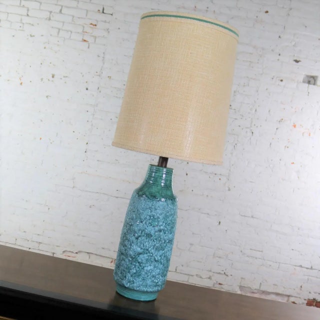 Handsome very large mid-century modern ceramic table lamp with a gorgeous turquoise lava glaze and its original shade done...