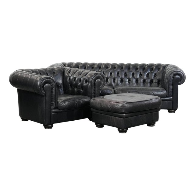 Black Chesterfield Sofa, Armchair, and Ottoman in Cowhide, Set of 3 For Sale