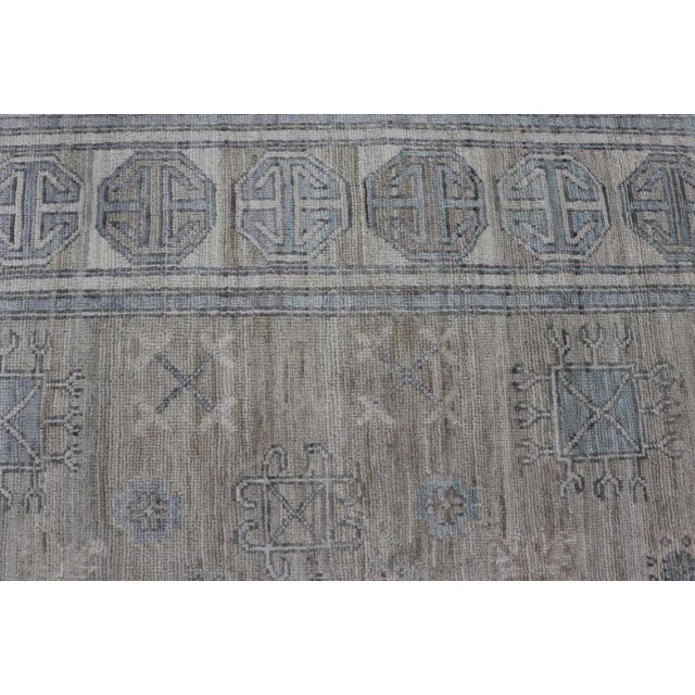 Cream Khotan Design Rug With Circular Medallion in Light Green Light Blue and Cream For Sale - Image 8 of 12