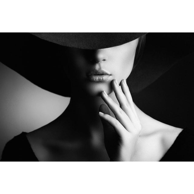 Beautiful woman in retro style Studio shot of young beautiful woman on dark background in retro style Paper size: 12 x 16"...