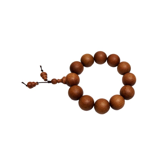Discover tranquility and a deeper connection with our exquisitely crafted Brown Wood Bead Prayer Rosary Bracelet. Each...