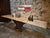 Antique French industrial table combining a cast iron base with a solid pine plank top. The cast iron base originates from...