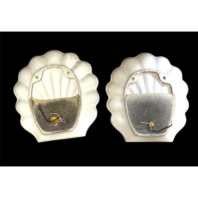Pair of stunning Paul Hanson Creamy White Shell Shaped Wall Sconces. Made in Italy.