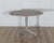 An authentic 18th-century Swedish Rococo tilt-top table, notable for its sculptural form and original construction. The...