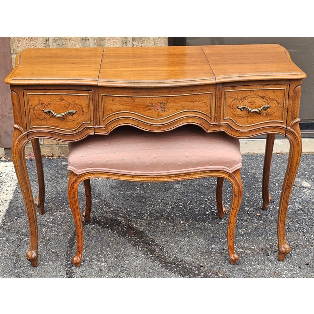 A mid Century Provincial Style Walnut Mirrored Vanity Table with Bench by Drexel Furtinure. Perfe try functional drawers...